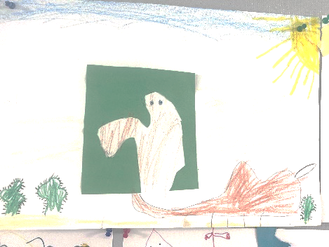 A child's drawing on a white board
Description automatically generated