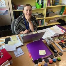 A teacher at her desk