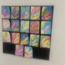 A collage of student artwork in an elementary school.